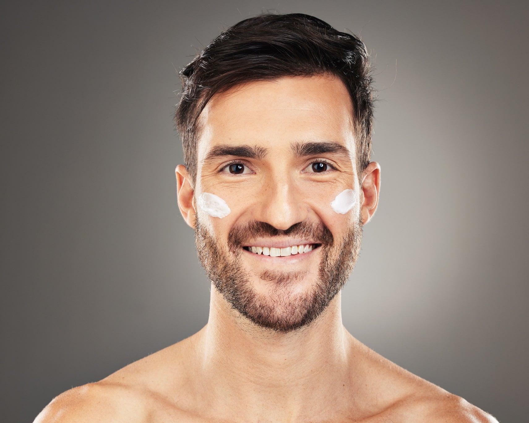 skincare-health-portrait-of-man-with-cream-on-fac-2023-11-27-05-17-49-utc-min.jpg